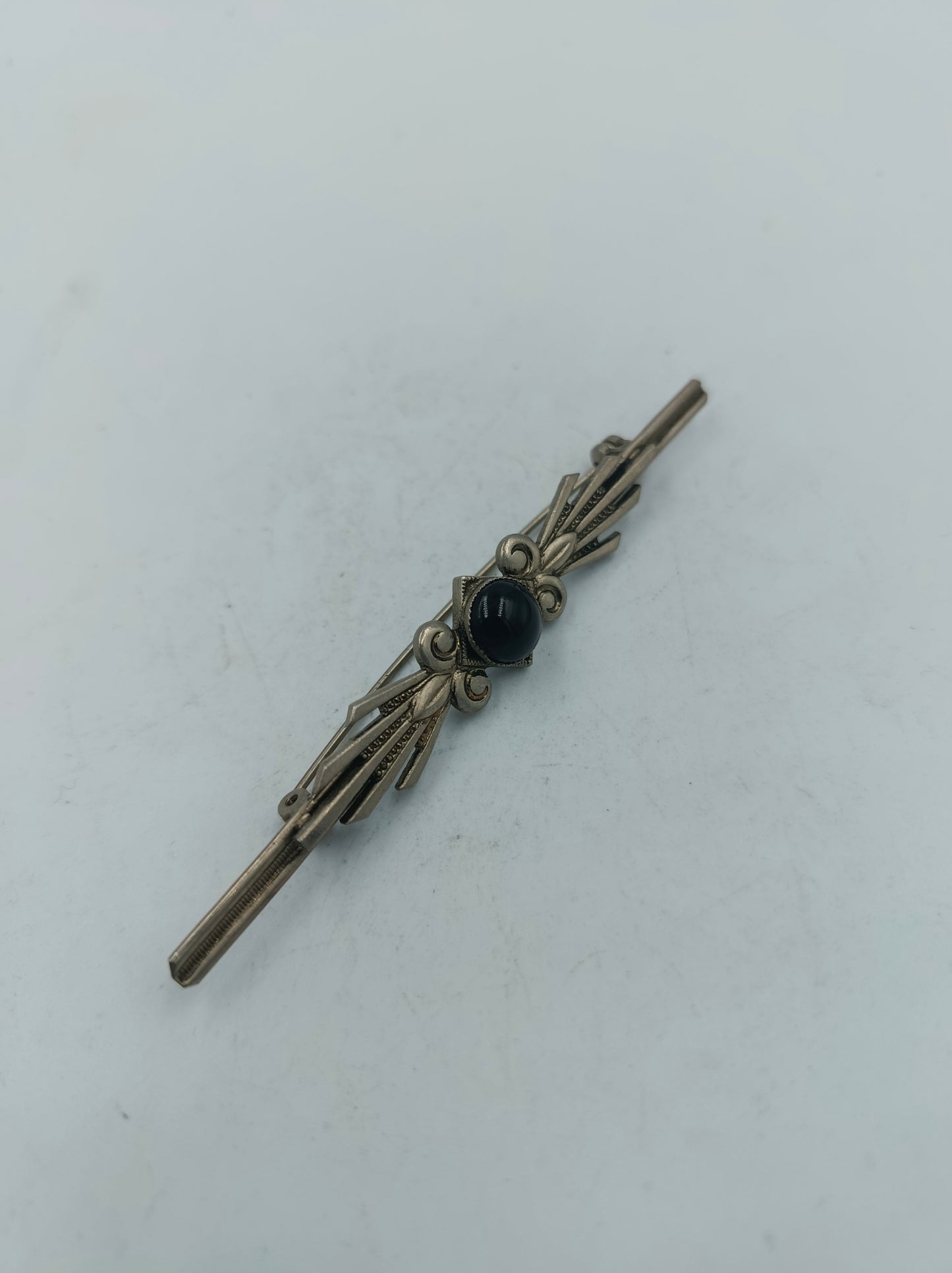 Elegante versilberte Vintage Stabbrosche mit schwarzem Cabochon