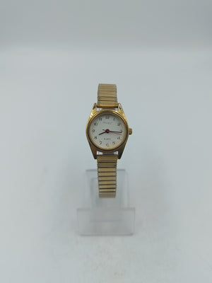 Goldfarbene Damenuhr mit elastischem Metallarmband und klassischem Zifferblatt