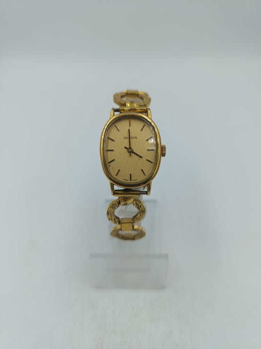 Alpina Vintage Armbanduhr mit goldenem Gehäuse und dekorativem Gliederarmband