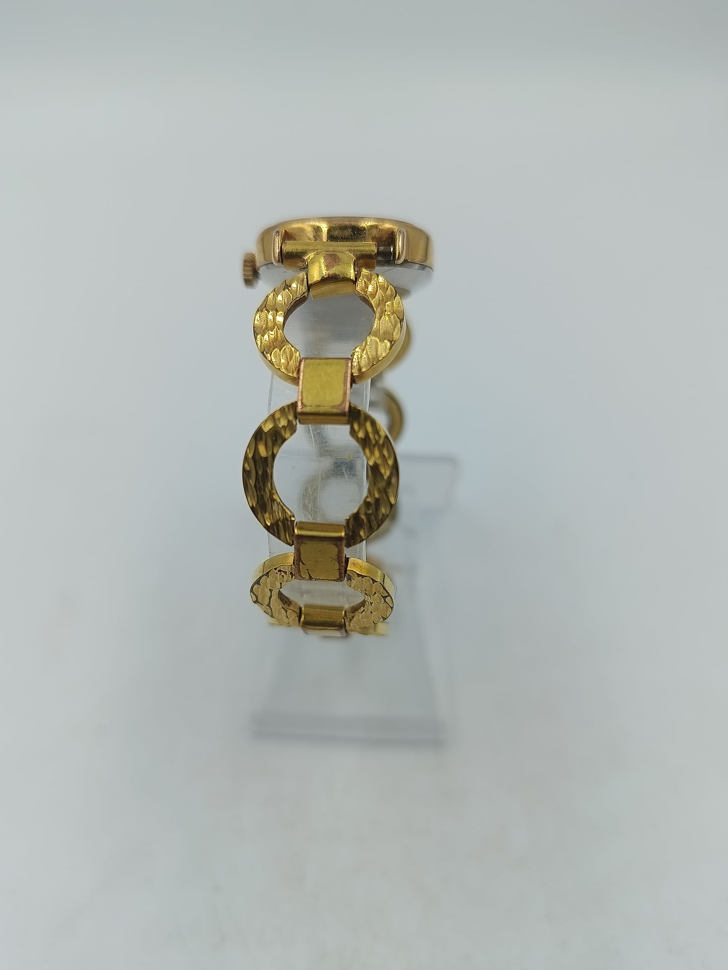 Alpina Vintage Armbanduhr mit goldenem Gehäuse und dekorativem Gliederarmband