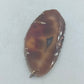 Natürlicher Stein Anhänger in Braun mit organischer Form und einzigartiger Maserung