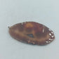 Natürlicher Stein Anhänger in Braun mit organischer Form und einzigartiger Maserung