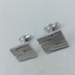 Rechteckige Manschettenknöpfe silberfarben mit strukturierter Oberfläche und klassischem Design