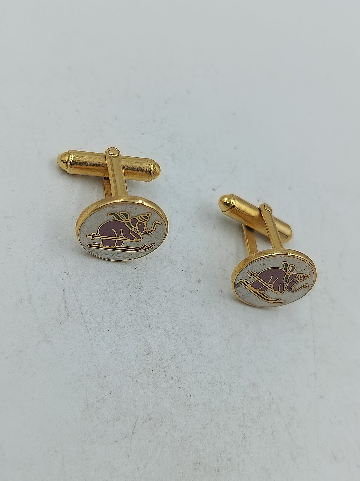 Elefant Manschettenknöpfe in goldfarbener Optik mit heller Emaille