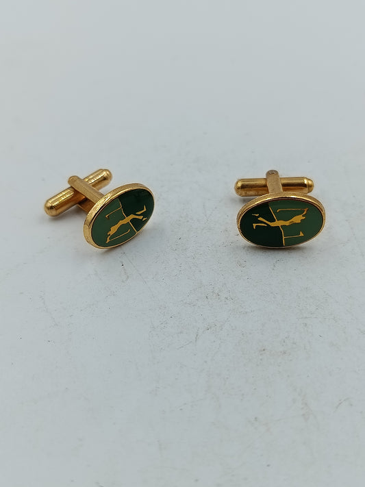 Goldfarbene Manschettenknöpfe mit grünem Emaille Motiv klassisches Design
