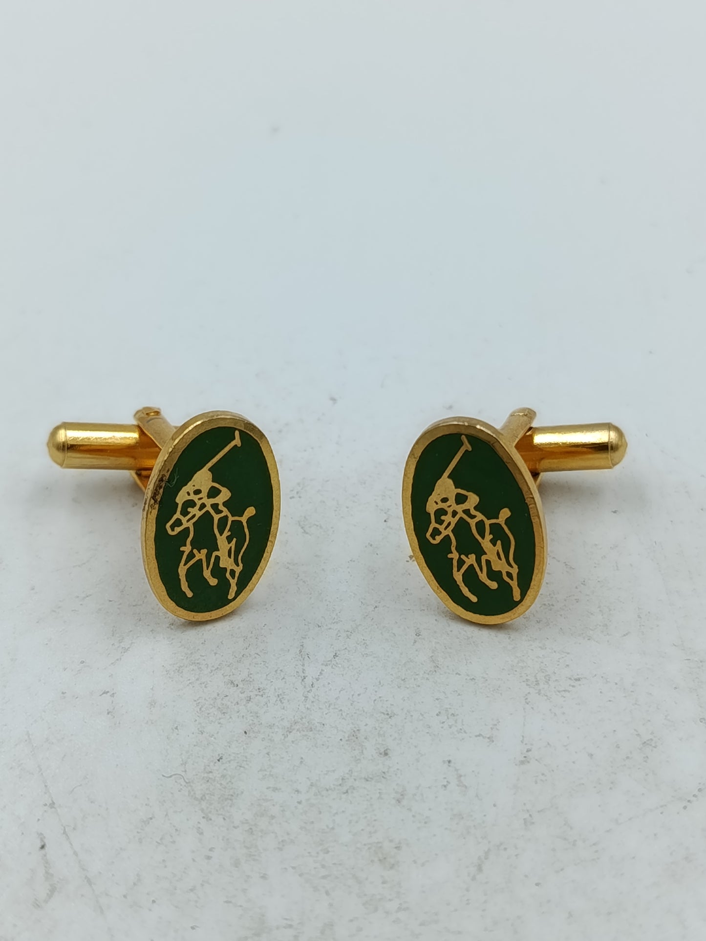 Elegante Manschettenknöpfe goldfarben mit grünem Polospieler Motiv