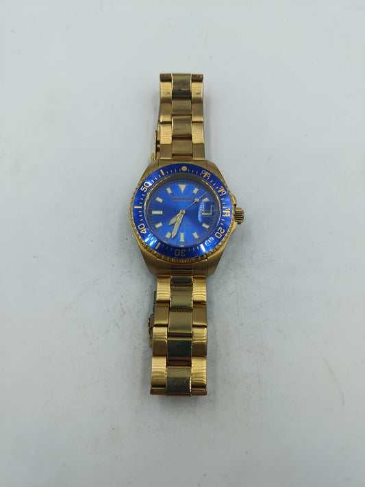 Goldfarbene Armbanduhr mit blauem Zifferblatt Metallarmband und Drehlünette