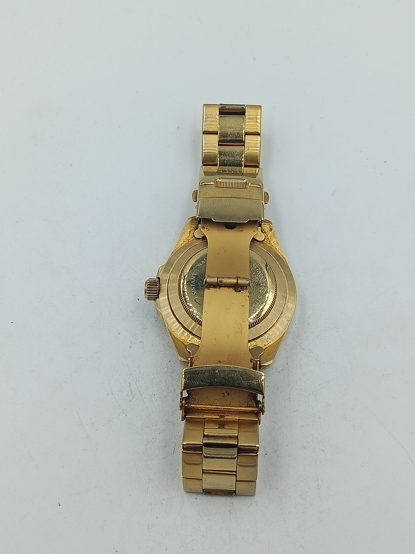 Goldfarbene Armbanduhr mit blauem Zifferblatt Metallarmband und Drehlünette