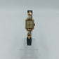 Goldfarbene Armbanduhr mit schwarzem Lederband Seiko Quartz
