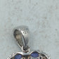 Silberanhänger mit blauen Edelsteinen im eleganten Herzdesign