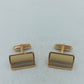 Elegante Manschettenknöpfe in Goldoptik mit rechteckigem Einsatz