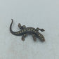 Elegante Silberbrosche in Echsenform mit funkelnden Markasitsteinen