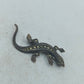 Elegante Silberbrosche in Echsenform mit funkelnden Markasitsteinen