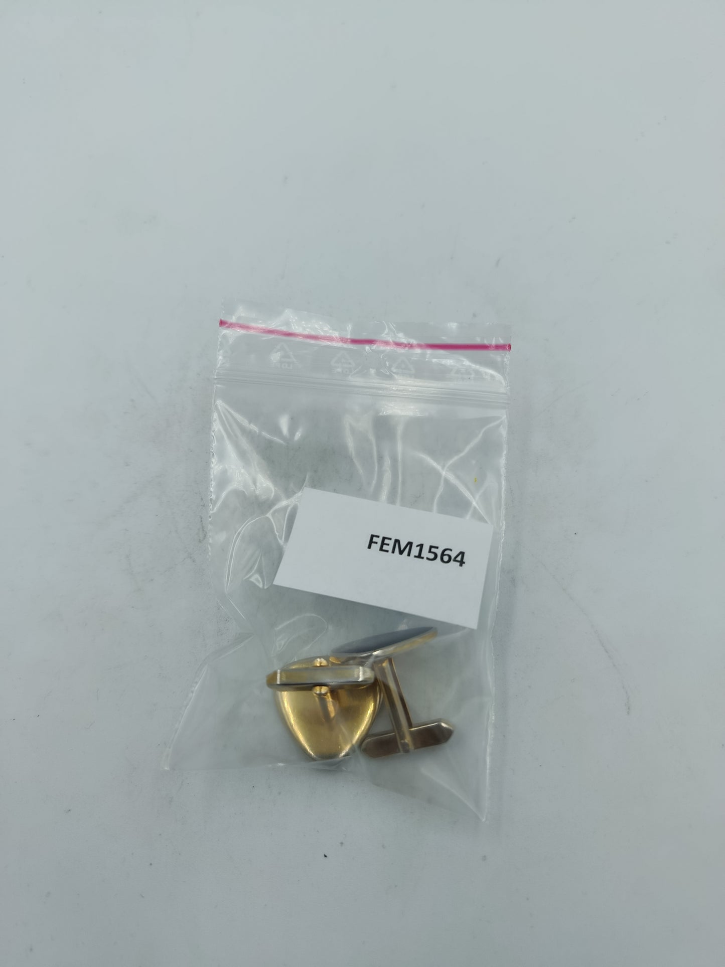 Elegante Manschettenknöpfe in Silber und Goldoptik mit dreieckiger Perlmutt Einlage