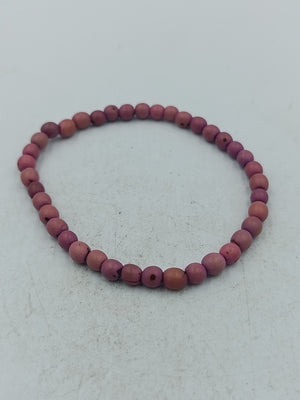 Elastisches Perlenarmband in sanftem Rosaton