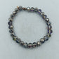 Elastisches Perlenarmband mit facettierten Glasperlen in edlem Grau und sanftem Schimmer