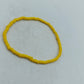 Schlichtes elastisches Armband aus gelben Glasperlen für sommerliche Akzente