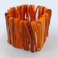 Markantes Armband in Bernsteinoptik mit warmen Orangetönen