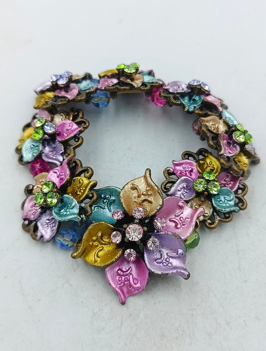 Farbenfroher Blumenarmreif im Vintage Stil mit funkelnden Ziersteinen
