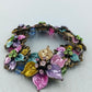 Farbenfroher Blumenarmreif im Vintage Stil mit funkelnden Ziersteinen
