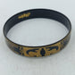 Schmaler Vintage Armreif in Schwarz Gold mit asiatischen Tiermotiven