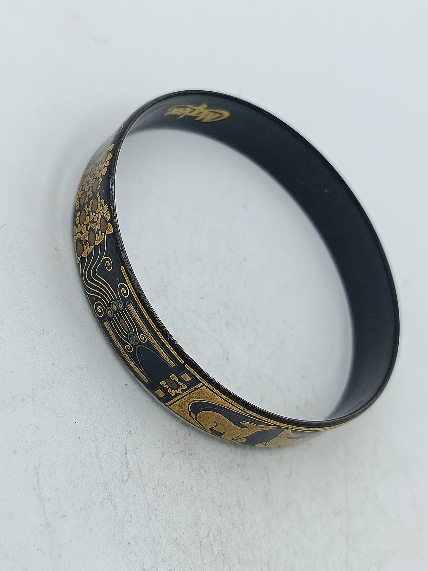 Schmaler Vintage Armreif in Schwarz Gold mit asiatischen Tiermotiven