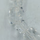 Transparenter elastischer Armreif mit facettierten Kristallperlen