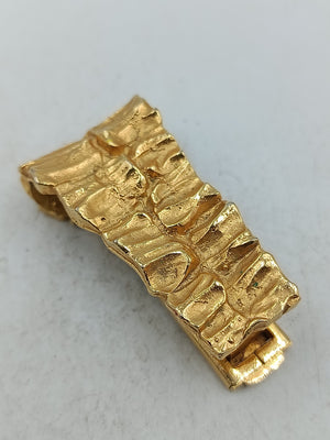 Goldfarbene Haarspange mit strukturierter Oberfläche im Vintage Design