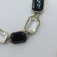 Elegante Gliederkette mit schwarzen und klaren Schmucksteinen