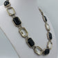 Elegante Gliederkette mit schwarzen und klaren Schmucksteinen