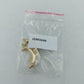 Goldfarbene Brosche mit zwei springenden Delfinen in elegantem maritimem Design