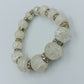 Elastisches Perlenarmband mit Crushed Glasperlen und Strass Zwischenringen