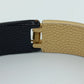 Moderner Armreif in Schwarz und Gold im minimalistischen Design
