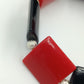 Elastisches Armband mit roten und schwarzen Elementen im modernen Design