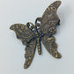 Vintage Schmetterling Brosche in antiker Bronzeoptik mit Ornamentprägung