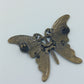 Vintage Schmetterling Brosche in antiker Bronzeoptik mit Ornamentprägung
