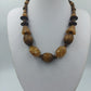 Statement Holz-Halskette: Warme Naturtöne & Deko-Elemente