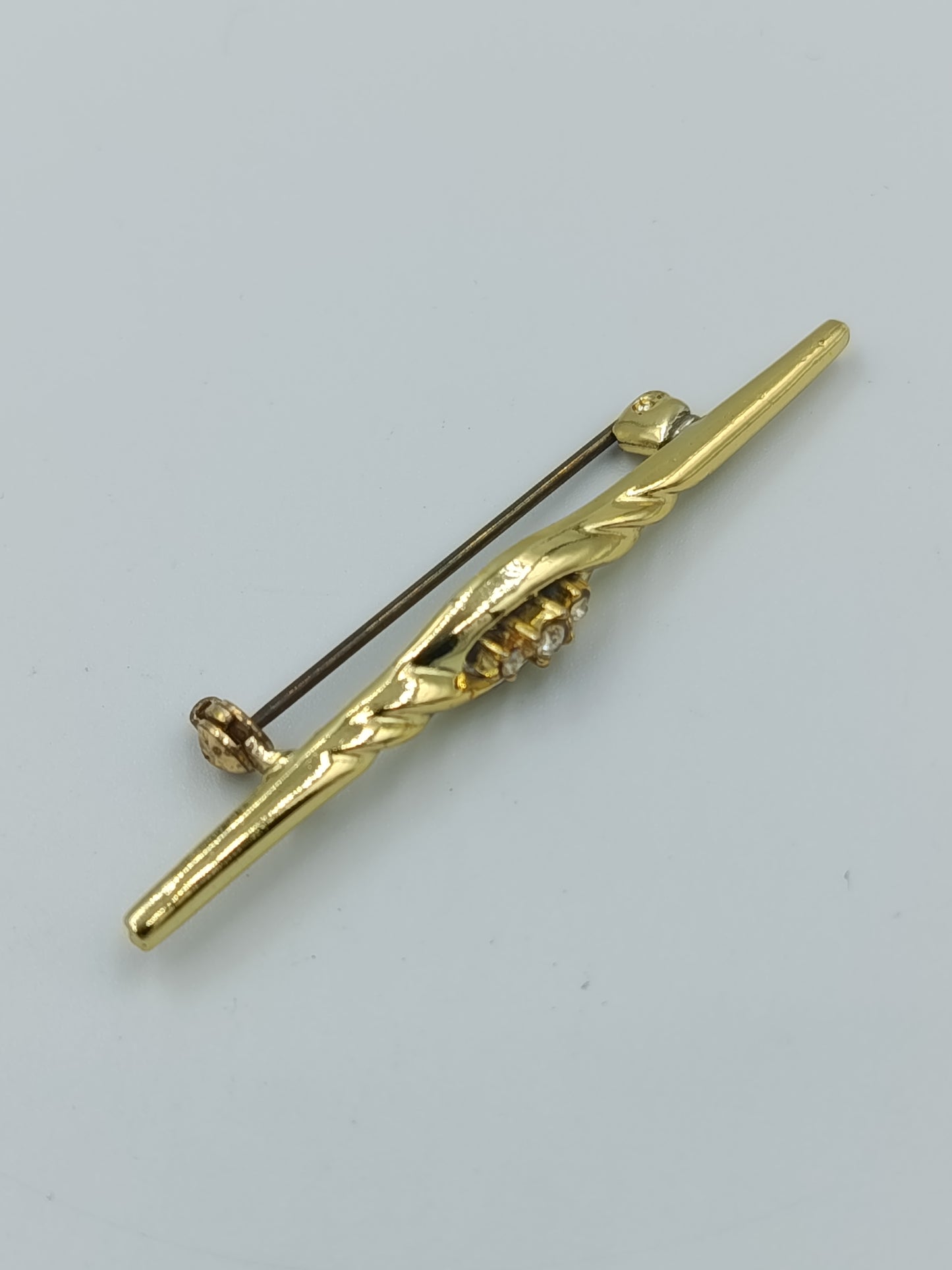 Elegante Vintage Stabbrosche in Goldoptik mit funkelnden Ziersteinen