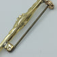 Elegante Vintage Stabbrosche in Goldoptik mit funkelnden Ziersteinen