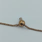Verstellbares Armband in Goldoptik mit Herzanhänger und funkelndem Stein