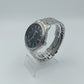 Lorus Vintage Herrenuhr: Silberoptik, schwarzes Zifferblatt & Datum