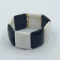Elastisches Armband in Schwarz Weiß mit geometrischen Elementen