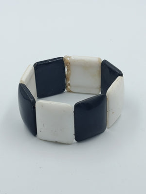 Elastisches Armband in Schwarz Weiß mit geometrischen Elementen