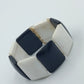 Elastisches Armband in Schwarz Weiß mit geometrischen Elementen