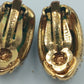 Vintage Ohrclips in Goldoptik mit funkelnden Strasssteinen Swarovski