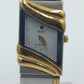 Elegante Bicolor Damenuhr mit geschwungenem Gehäuse in Gold und Silberoptik