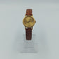 Elegante Tissot Damenarmbanduhr Goldfarben mit Datumsanzeige Lederband
