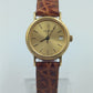 Elegante Tissot Damenarmbanduhr Goldfarben mit Datumsanzeige Lederband
