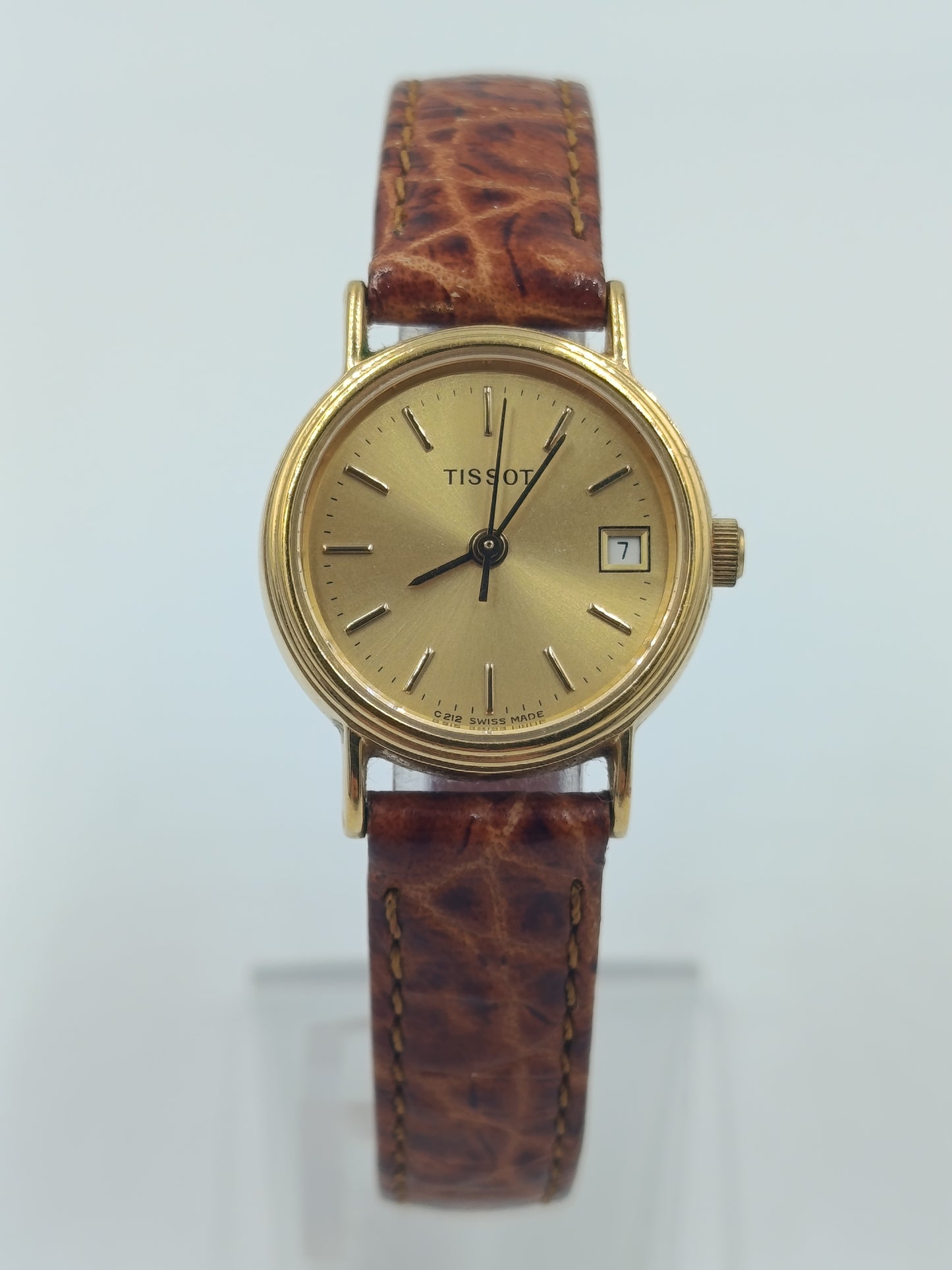 Elegante Tissot Damenarmbanduhr Goldfarben mit Datumsanzeige Lederband