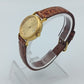 Elegante Tissot Damenarmbanduhr Goldfarben mit Datumsanzeige Lederband